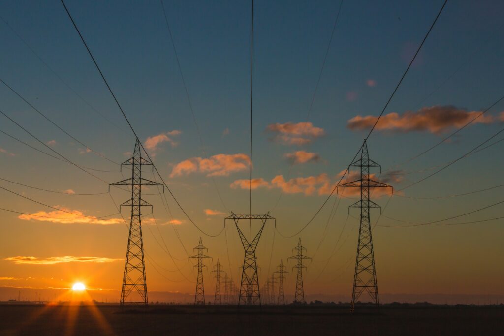 Power pylons at sunset